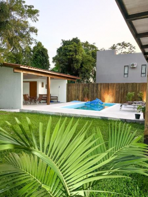 Lagoa Flat House - Praia do Rosa - 300 metros da Surfland